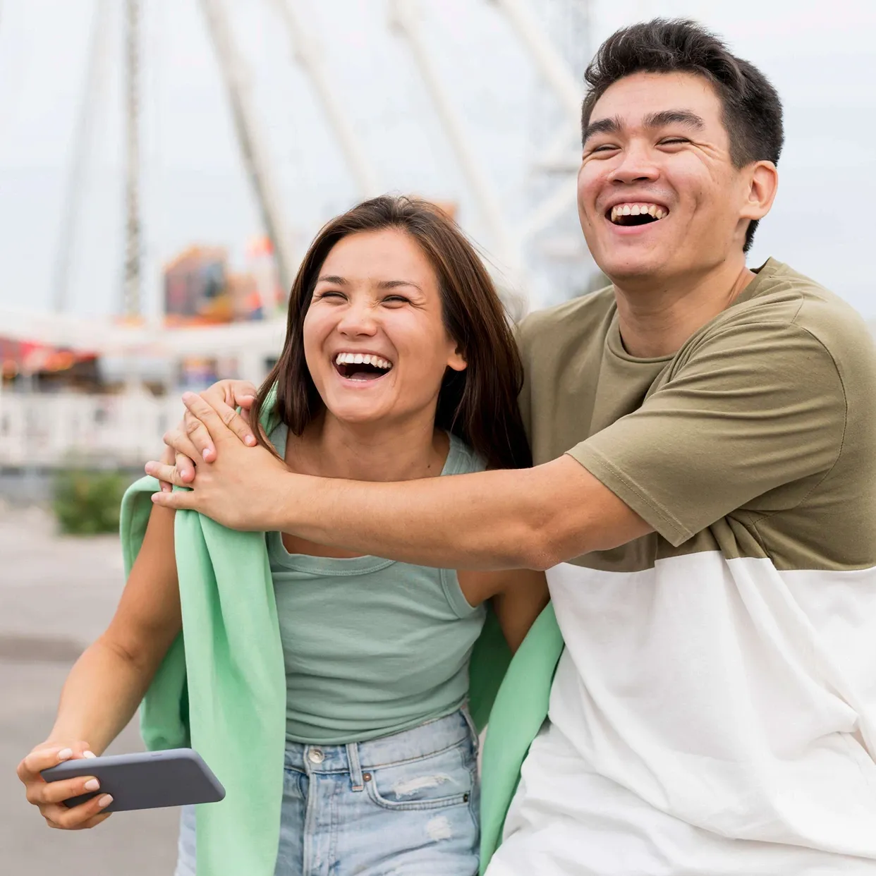 A couple looking happy after seeking premarital counselling in Malaysia.